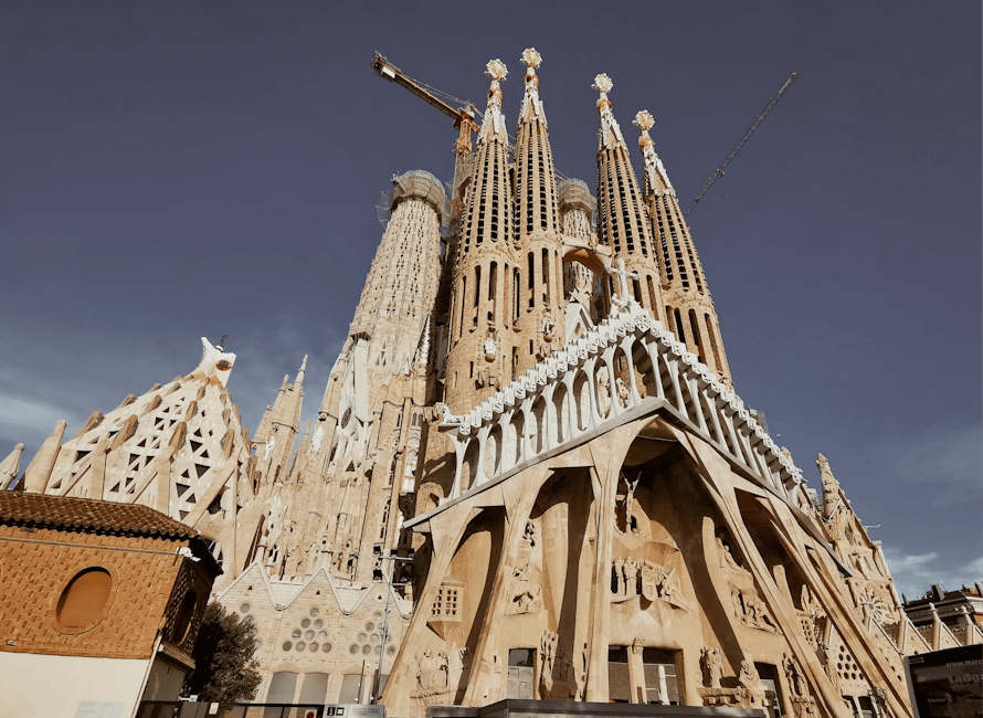 Majestic view of Sagrada Familia in Barcelona showcasing intricate architecture and towering spires.