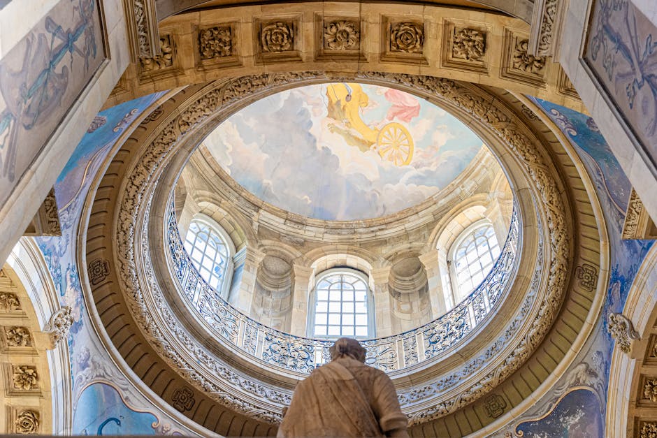 The intricate dome interior of Castle Howard, showcasing stunning architecture and art under natural light.